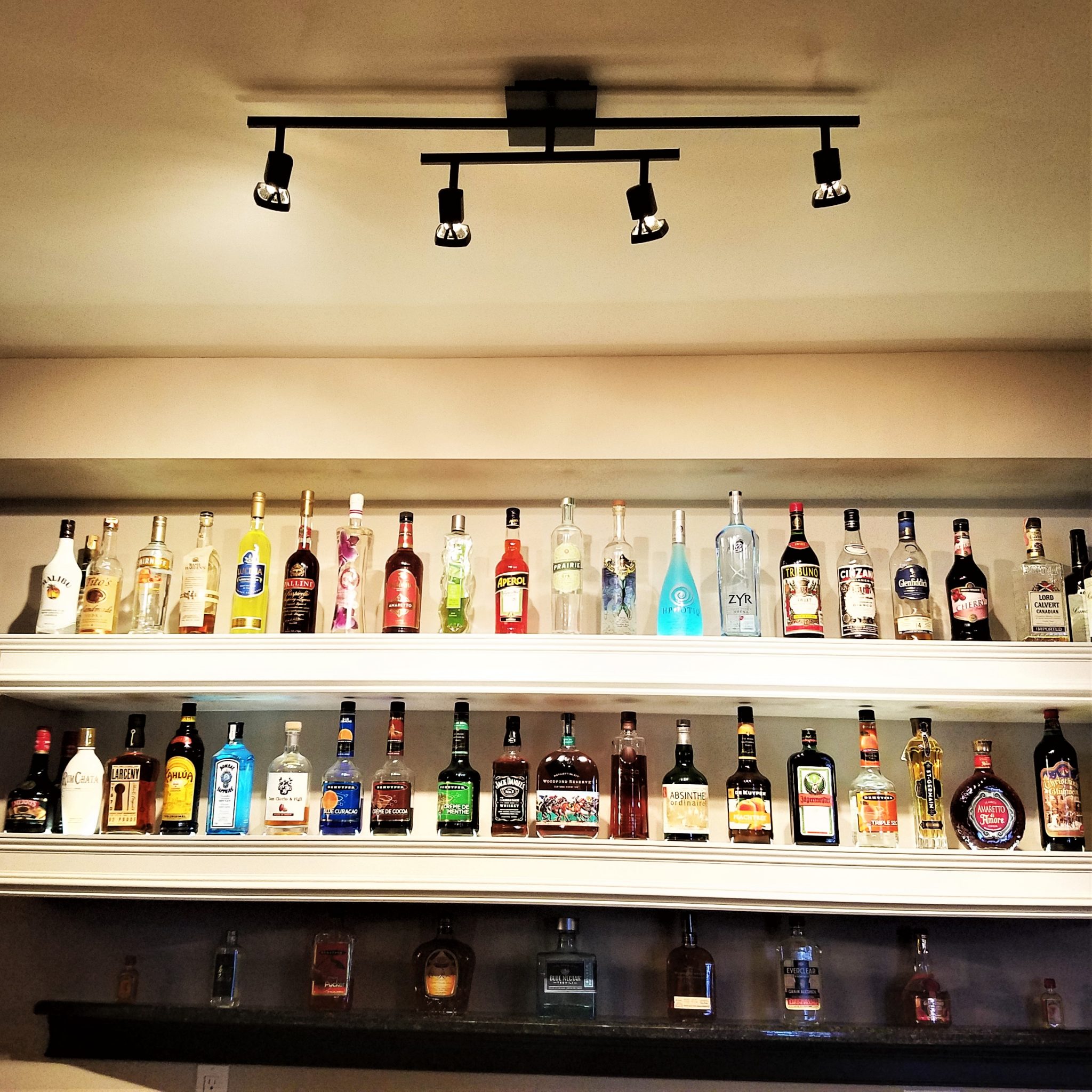 BASEMENT BAR IDEAS LIQUOR BOTTLE STORAGE Renee Romeo