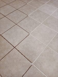 Make grout cleaner looking with grout paint