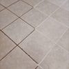 Make grout cleaner looking with grout paint